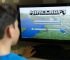 An image featuring a child playing Minecraft