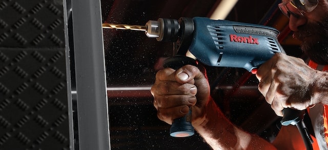 man using power tool